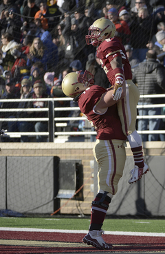 BC wide receiver Sherman Alston is lifted in the air after hauling in a 26-yard touchdown pass in the second quarter.