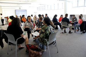 Administrators, faculty and staff and students gather in a classroom in Newhouse for the first Cuse Conference, in which members of the university community discussed campus issues and possible solutions.