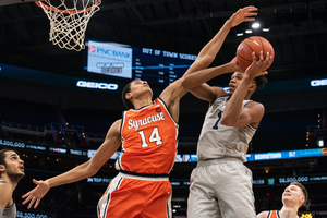 Jesse Edwards and Syracuse will travel to face Georgetown after losing to Villanova. 