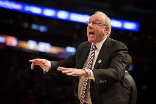 Boeheim motions toward the court. After the game, he said his team had a long way to go. 