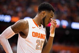 Christmas puts his hand to his eyes during SU's win.