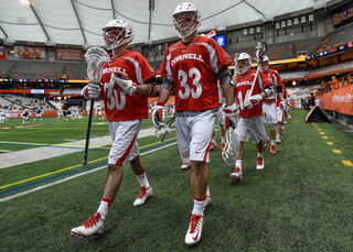Cornell players get ready to take on Syracuse in what would end up being a 14-6 win for the Orange. 
