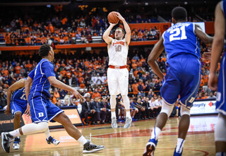 Trevor Cooney elevates for a 3-point shot. The SU junior guard went 3-for-10 from beyond the arc on the night. 