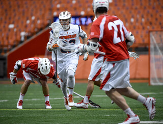 Tom Grimm loses two Cornell players at half field. 