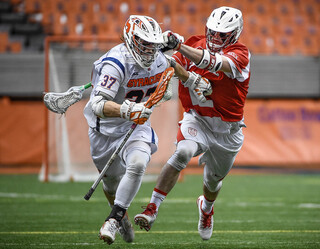 Williams breaks away from a Cornell player.