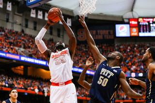 Christmas drives his way past Pittsburgh's defense. The SU forward had 20 points and 12 rebounds on the day.