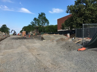 Stairs have been built along University Place in front of the Schine Student Center. The stairs will eventually lead to a platform on the promenade. Photo taken July 22, 2016