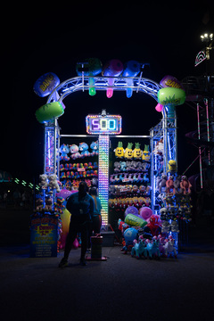 A myriad of carnival games lined Wade Shows Midway at the New York State Fair.