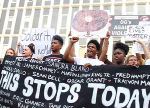 A little more than 200 protesters to made the walk down South Franklin Street, past East Jefferson Street, up Montgomery Street, past East Washington Street and down South State Street.