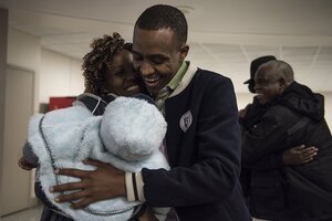 Bryan Cereijo won fifth place in ACP's photo competition for capturing this image of Ndunndiwe Cubahiro and his sister-in-law reuniting at Syracuse's Hancock International Airport in February as part of a Daily Orange series on refugees in central New York.