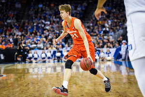 Marek Dolezaj, pictured against Duke last season, has gained recognition for his passing as a starter and off the bench this year. 