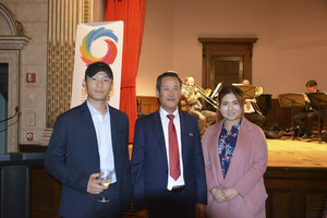 (Left) Ziguang Lu and Jiayu Qiu pose with North Korean Ambassador to the United Nations Kim Song (Middle)