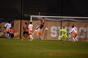 Sondre Norheim rises up and heads the ball into the goal on a corner kick. He scored two goals on Saturday night. 