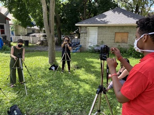 Ana Vîjdea, Hibatullah Shallan, Aman Yohannes and Gemma Cooper-Novack set up their cameras during a Narratio fellowship activity.