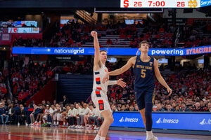 Justin Taylor practiced with his sister's trainer to develop his confident shooting game that he's brought to Syracuse.