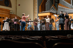 In Setnor Auditorium, all participants of Flute Day came together to perform. The group played several pieces, each directed by a different person.
