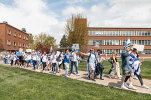 Pro-Israel demonstrators walking on the quad in response to the Gaza Solidarity Encampment. The demonstrators started walking about noon and continued until 12:45, ending with display of song and dance.