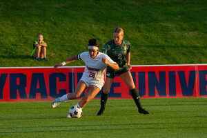 Ashley Rauch and Erin Flurey (pictured, No. 26) both scored for Syracuse, helping it defeat Siena 2-0 to remain unbeaten on the season.