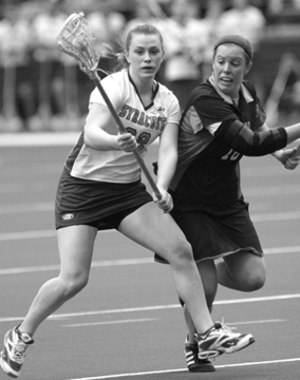 Seth Siditsky / The Daily Orange				 Jessica Bell and the No. 14 Orangewomen pulled out a 12-11 overtime victory against No. 3 Virginia on Saturday at the Carrier Dome.