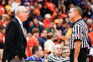 Jim Boeheim talks to an official.