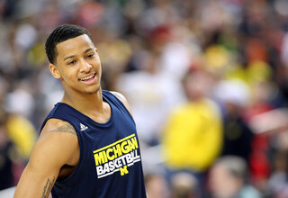 Trey Burke (3) of the Michigan Wolverines looks on on the court during the Final Four practices of the 2013 NCAA Men's Basketball Tournament at the Georgia Dome.