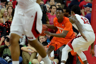 Joseph attempts to evade the Wolfpack press as N.C. State guard Anthony Barber pressures.