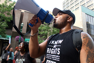 Organizers led the entire crowd in united chants of 