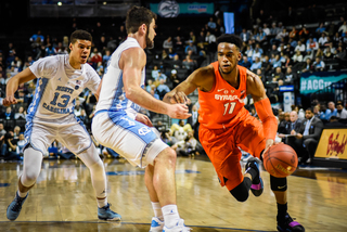 Brissett looks to drive left against Luke Maye. Brissett produced his 12th double-double of the year, shooting 7-of-14 from the field, 5-of-7 from beyond the arc and 1-of-2 from the charity stripe.