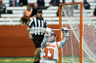 Drake Porter reaches to make a save.