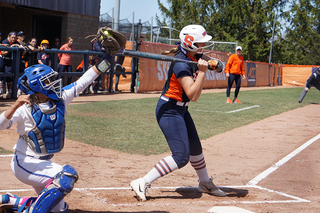 A Syracuse batter takes a high pitch. 