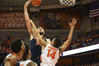 The Cavaliers sliced through SU's 2-3 zone for 26 points in the paint. 