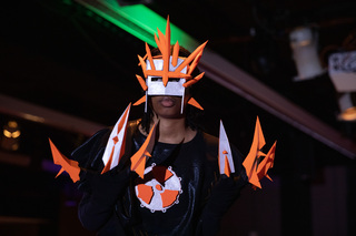 Sita Onofrietti wears radioactive sign while walking in FADS spring show themed “Abiotic Wanderers.”